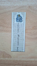 Music bookmark front with microphone, speakers, musical notes and beige handwriting-style pattern.